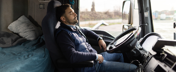 Man sleeping in truck